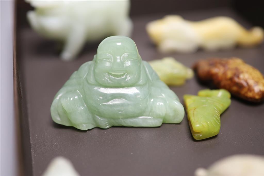 Six Chinese jade and hardstone animal carvings, two dragon belt hooks, a rams head and a soapstone seal, 10cm